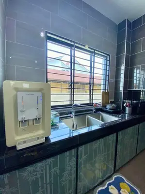 a kitchen with a sink and a counter with a window at LYL Journey House at Ipoh Town Centre 17PAX 6BR in Ipoh