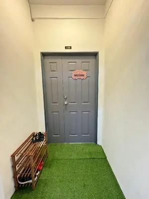 a door in a room with a green floor at DADDY HOMES 2 Emerald Avenue Centrum BRINCHANG VIEW in Brinchang