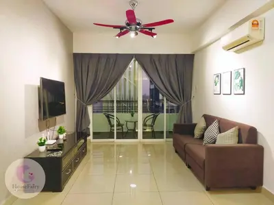 a living room with a couch and a ceiling fan at The Majestic Condo Ipoh Home Fairy 4 in Ipoh