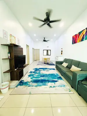 a living room with a blue rug on the floor at JaszSpace at Kulim Hi-Tech - All Room Aircond,Wifi,Netflix in Kulim