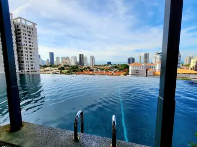 a view of a large body of water from a building at Seaview Studio Tropicana 218 Macalister Georgetown in George Town