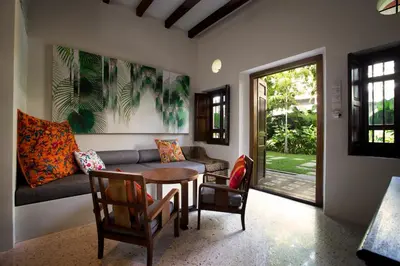 a living room with a couch and a table at Muntri Grove in George Town
