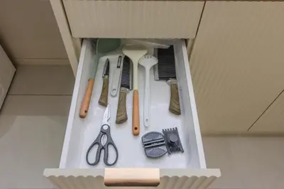 a drawer with many different types of tools in it at Designer Suites 2BR Apartment in Penang near George Town Self Check-In WiFi Partial Seaview in Jelutong