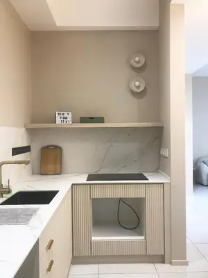 a kitchen with a sink and a counter top at Designer Suites 2BR Apartment in Penang near George Town Self Check-In WiFi Partial Seaview in Jelutong