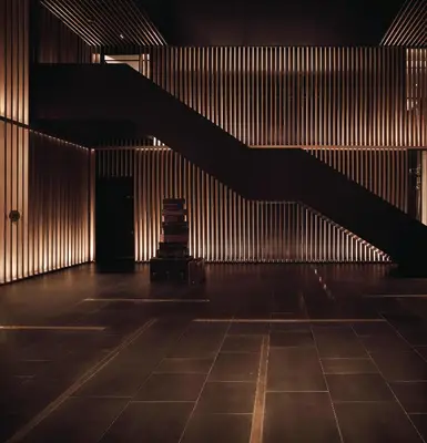an empty room with a staircase in a building at G Hotel Kelawai in George Town