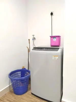 a small refrigerator with a pink container on top of it at Exclusive Studio, 20th, 5pax, Gurney, Mansion One, Gleneagle Hospital in George Town