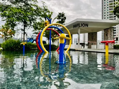 a fountain in a pool of water in a city at b29 Condo In Georgetown Familystay 3BR-10PAX in Jelutong