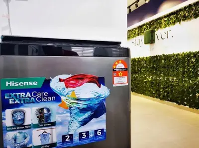 a machine with an advertisement for an air crate extra clean at 11pax5br Modern 5mins Ipoh Town wPoolTable in Ipoh