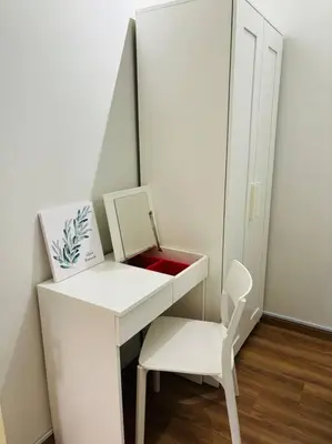 a white desk and a chair in a room at The Cove Hillside Ipoh by Iconique in Tambun