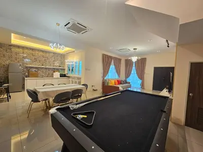 a large living room with a pool table in it at jia Residence 21 pax Karaoke & Snooker in Ipoh