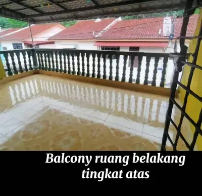 a pool of water on a balcony with a fence at RS Homestay Gerik in Gerik