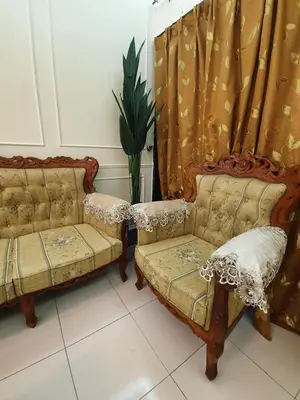 two chairs and a couch in a room at Teratak Ayuni with Private pool in Batu Gajah