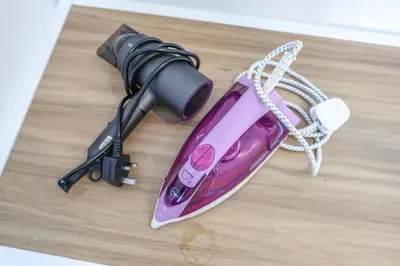 a flashlight sitting on a table with a gun at Minion Family Adventure Homestay in Cameron Highlands Clover Home 6-30 in Brinchang