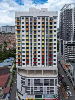 an overhead view of a tall white building with colorful windows at The Sun Executive #BayanLepas #QueensbayMall #13 in Bayan Lepas
