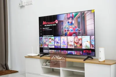 a flat screen tv sitting on top of a table at HAZZ Homestay Puncak Ihsan in Kulim