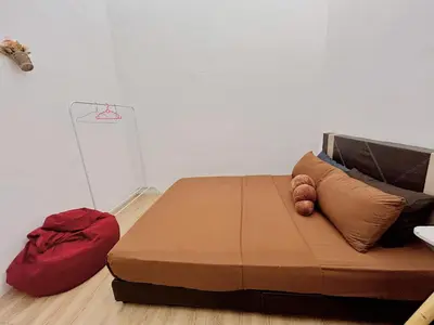 a bed sitting on the floor in a room at Home95#4pax#BukitMertajam in Bukit Mertajam