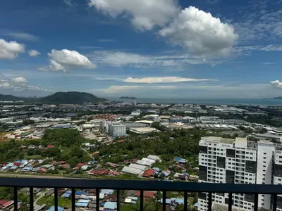 an aerial view of a city with buildings and trees at Meritus Seaview Apartment in Perai