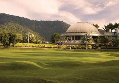 a view of a golf course with a building at IPOH Apartmen Casa Kayangan Meru, Meru Raya 5 Ipoh Homestay in Ipoh