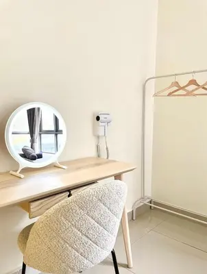 a dressing table with a mirror and a chair at Mizu Homestay Kea Farm 10mins to BOH in Cameron Highlands