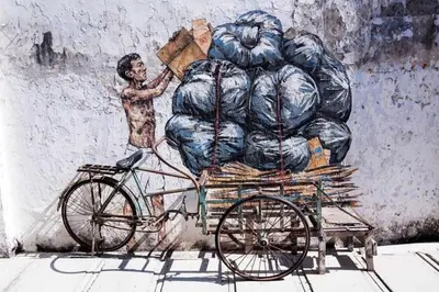 a painting of a man pushing a cart filled with bags at Ipoh The Majestic Imperial Tower Ipoh Town Centre, 3BR Fully Air Con Homestay in Ipoh