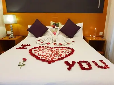 a bed with a heart made out of red roses at Cameron Nova Highlands Resorts II in Brinchang