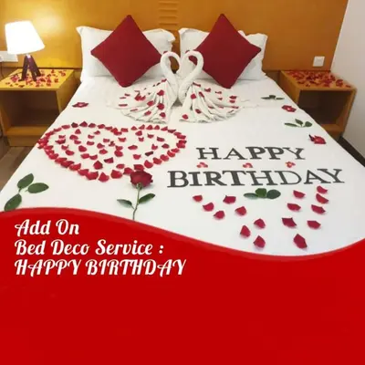 a bed with a happy birthday sign on it at Cameron Nova Highlands Resorts in Brinchang