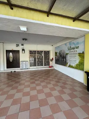 a large room with a picture of an elephant on the wall at Joyhome Homestay in Kampong Lumut Kiri