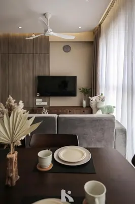 a living room with a couch and a table at Sky High Stuning Penang Bridge & City Views 3BR in Jelutong