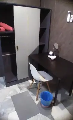 a black table and a white chair in a room at 1Pax-2Pax Single Room in Bukit Mertajam Alma Impian in Juru