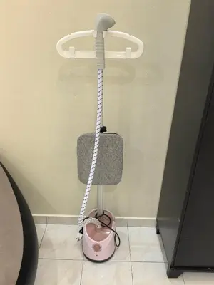 a room with a phone hanging from a wall at Padang Serai Premier Home in Kampong Dekeh