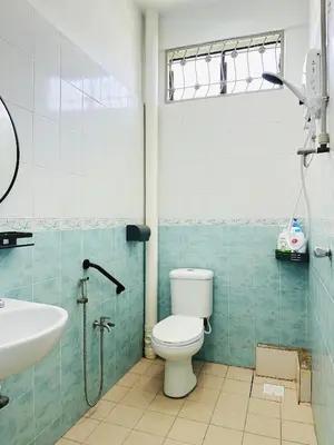 a bathroom with a toilet and a sink at BM\u5927\u5c71\u811a Alma Single Storey Semi-D 5-minute To Aeon Mall in Bukit Mertajam