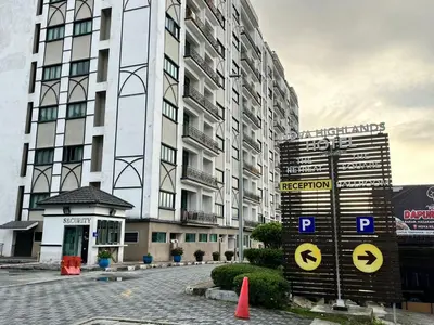 a large building with a street sign in front of it at The Retreat Mountain & Sunrise view Hilltop Hotel Apartment in Cameron Highlands in Cameron Highlands