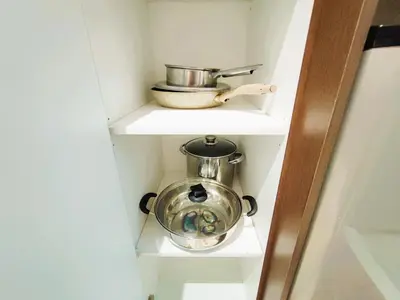a shelf with a pot and a bowl on it at Somer GoldenHills Cameron Highlands Free Wi-Fi in Brinchang