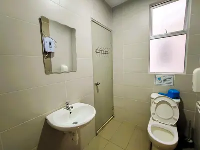 a small bathroom with a toilet and a sink at Somer GoldenHills Cameron Highlands Free Wi-Fi in Brinchang