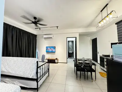 a living room with a bed and a dining room at View of Whole Georgetown Sea&City View 3BR-12 a27 in Jelutong