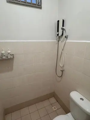 a bathroom with a shower with a phone on the wall at Cozy Corner Home Alma Near AEON \u5927\u5c71\u811a\u6e29\u99a8\u6c11\u5bbf in Bukit Mertajam