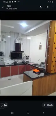 a view of a kitchen with a counter top at Crystal Creek Taiping in Taiping