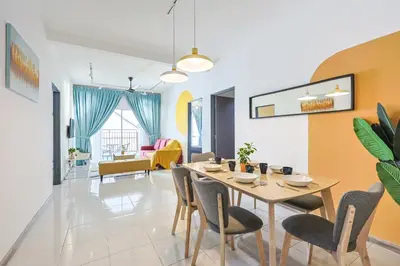 a dining room and living room with a table and chairs at Cozy Premium Family Homestay in Cameron Highlands Brinchang Clover Home 4-06 in Brinchang