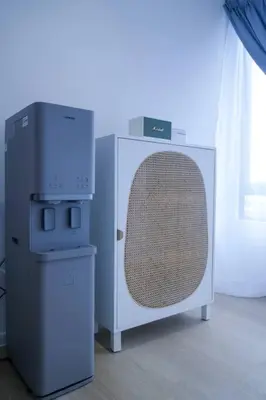 a large appliance next to a machine in a room at Tung's Hideout- Centrum Cameron in Brinchang