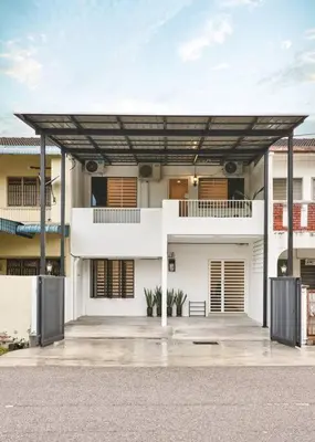 a white building with awning in front of it at Ipoh South Homestay 8-16pax 10mins to attraction in Ipoh