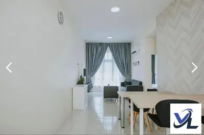 a living room with a dining room table and chairs at Close Dun Book in Ipoh