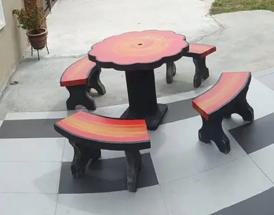 a table with two chairs and a table with a table at Ipoh Buntong Corner homestay in Ipoh