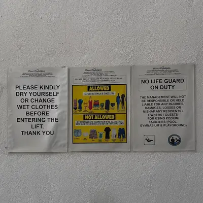 a group of signs on the wall of a building at O Homestay Meru Ipoh at Casa Kayangan - Musleem in Bandar Meru Raya