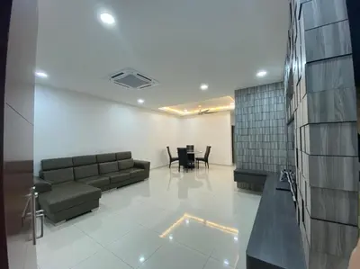 a lobby with a couch and a table and chairs at L26 happy homestay in Kampong Sungai Udang