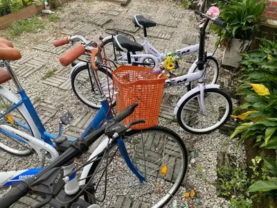 a group of bikes parked next to each other at Pintu A Damai D'Sawah in Kampong Parit Fourteen