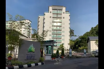 a large white building in front of a building at Removed listing in Tanah Rata