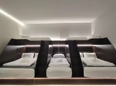 a room with two bunk beds in it at The great hotel greenhill in Ipoh