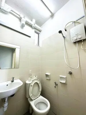 a bathroom with a toilet and a sink at TuR05-Pisa Stadium-3room-Private in Bayan Lepas
