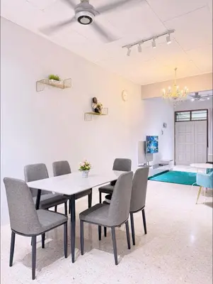 a dining room with a table and chairs and a pool at Mk&V butterworth in Butterworth