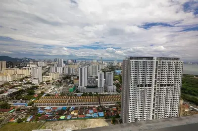 an aerial view of a city with tall buildings at UA19 #3BR 3 Queen Bed #Family Staycation in Jelutong